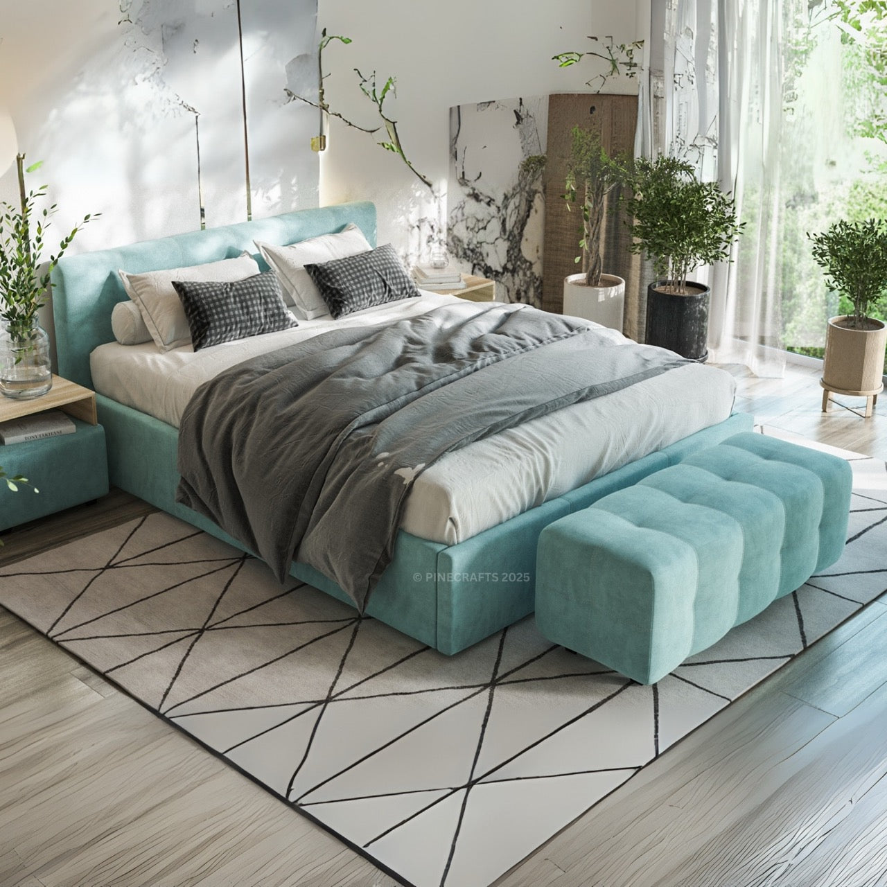 Modern bedroom with a teal bed and ottoman on a geometric rug.